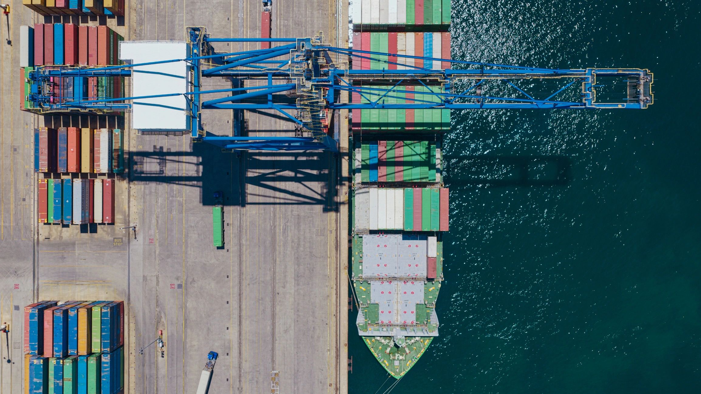 Container ship at port with cargo operations