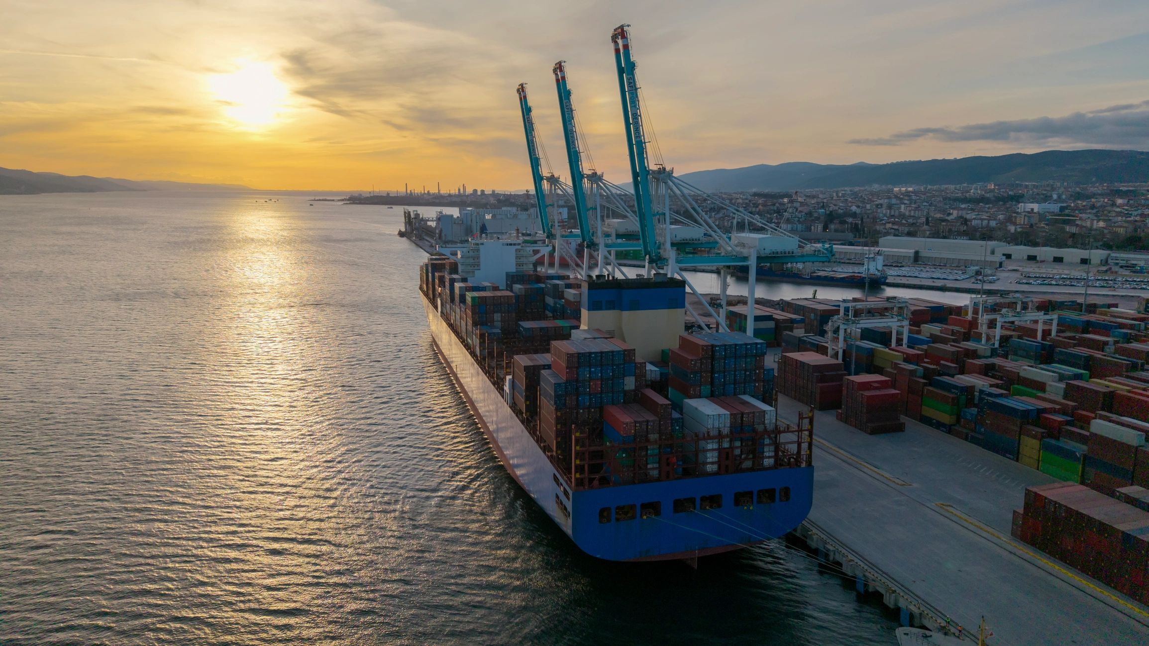 Commercial port logistics at sunset
